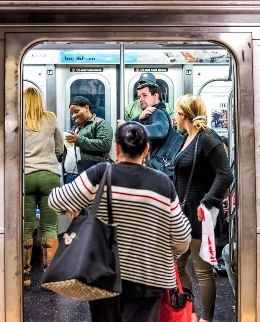 People in underground platform transit