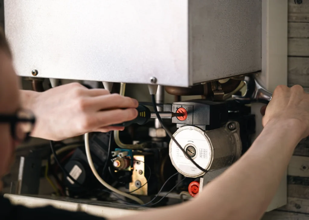Man is repairing appliance