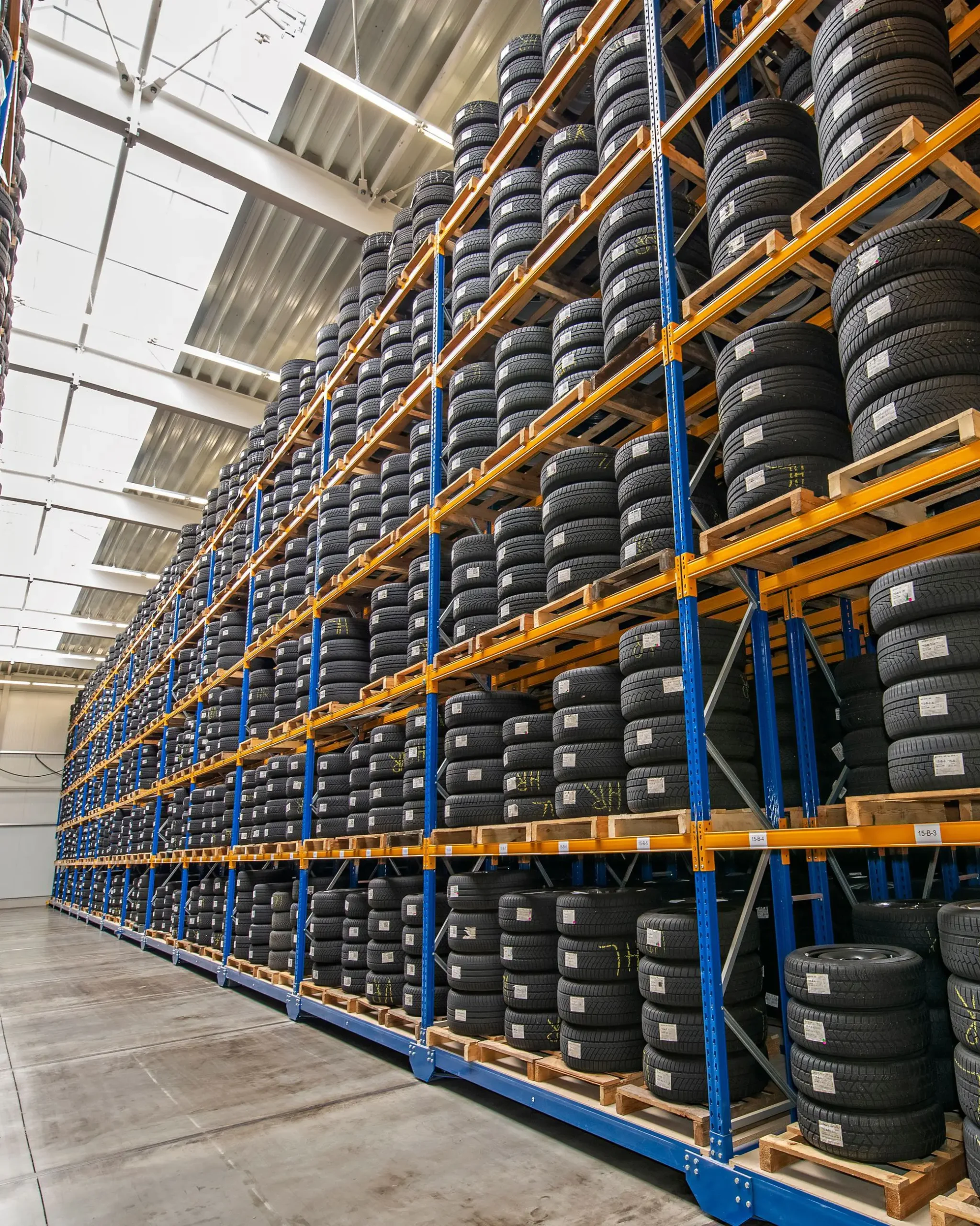 Tire warehouse with high shelf stock photo