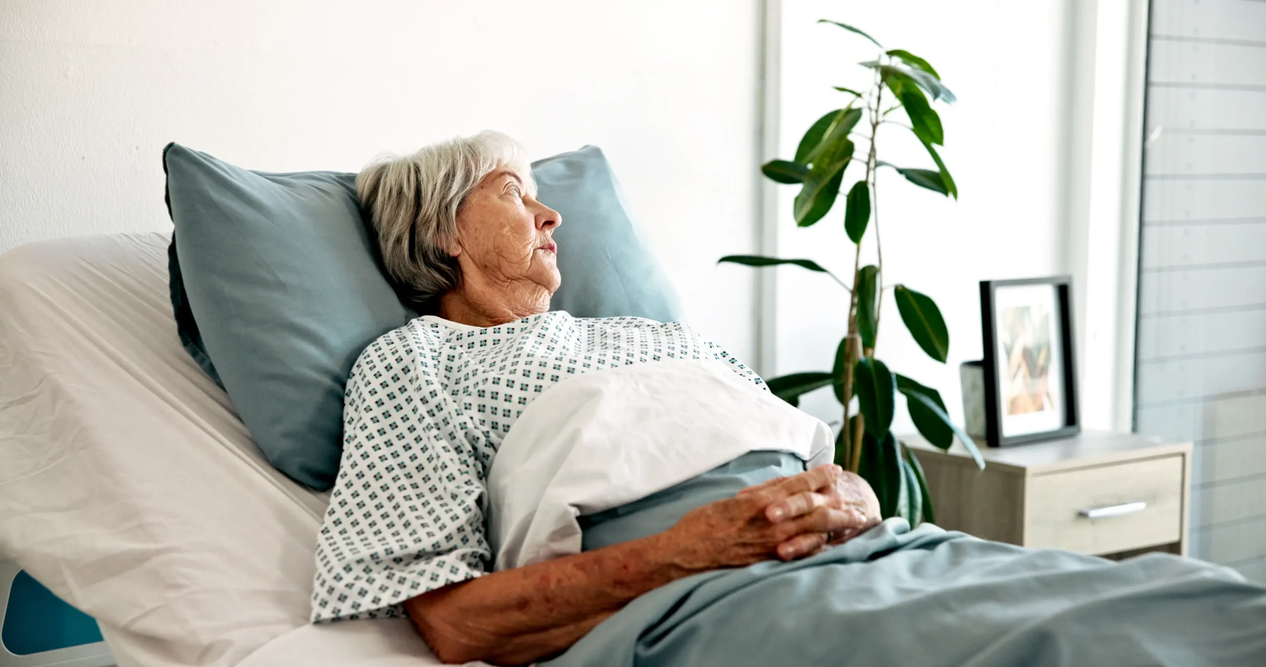 old woman in hospital bed