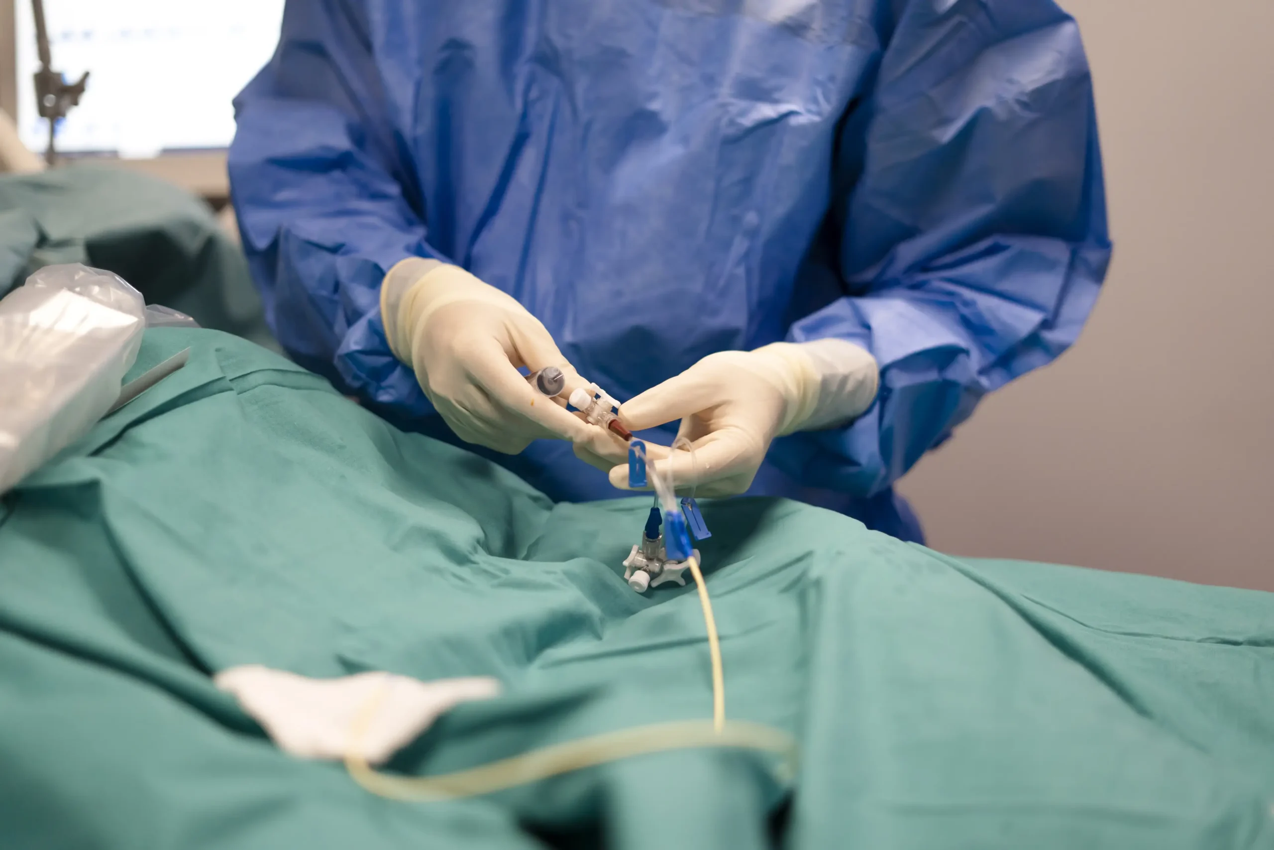 Surgeon preparing iv catheter