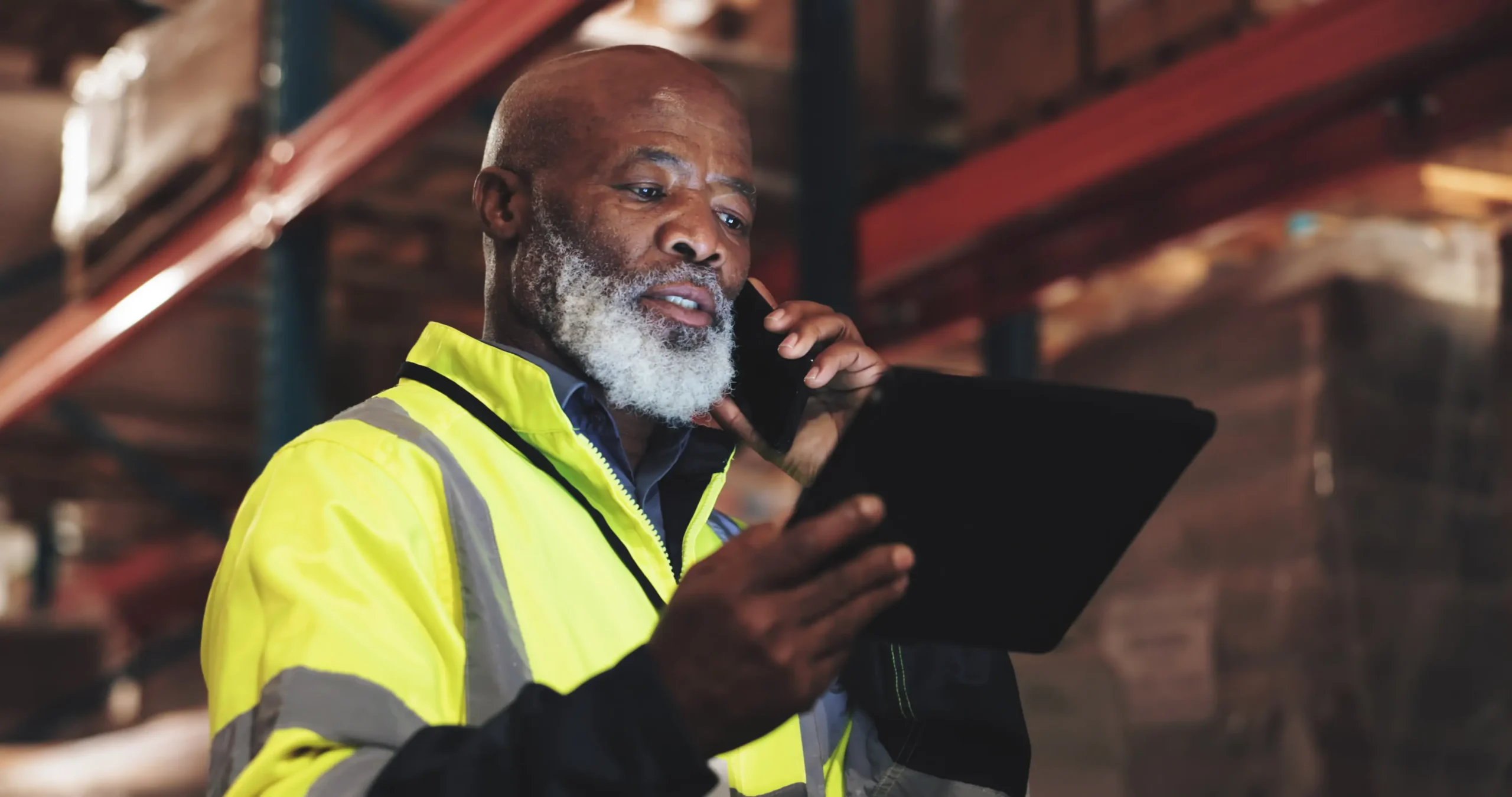man and tablet with phone call
