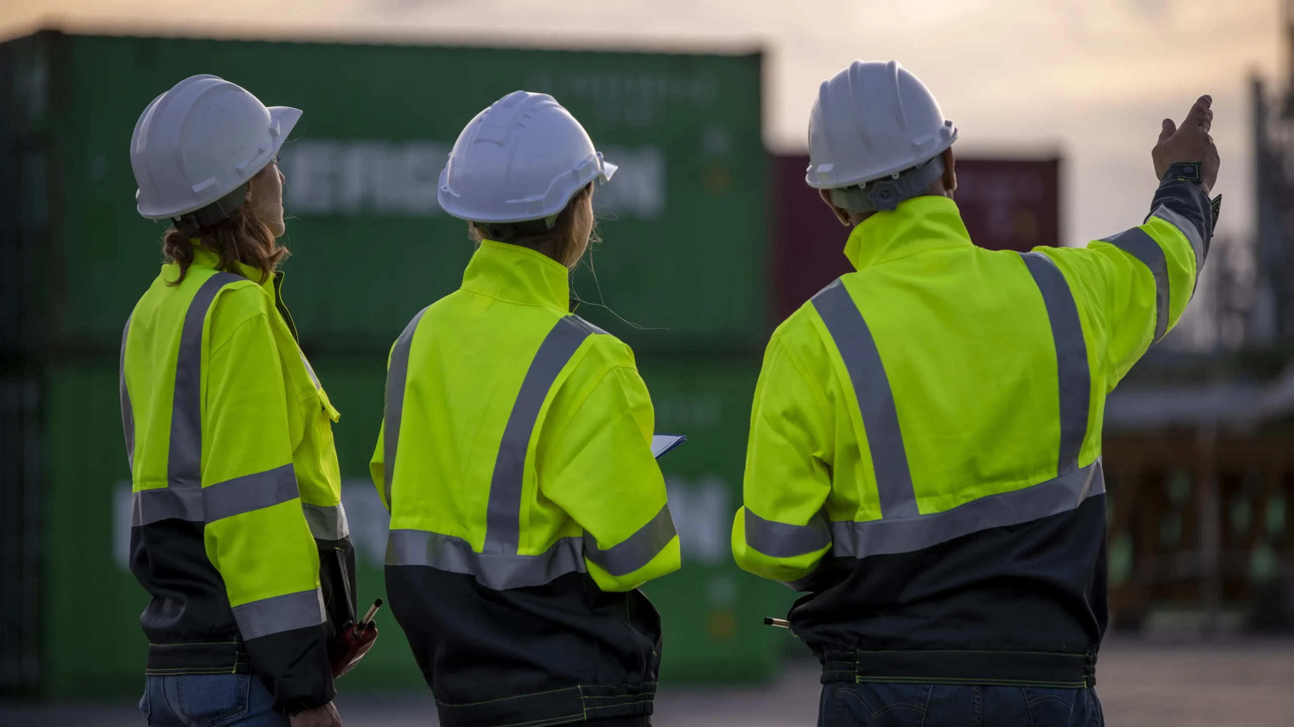 Engineer or dockworker working in the construction container dock yard
