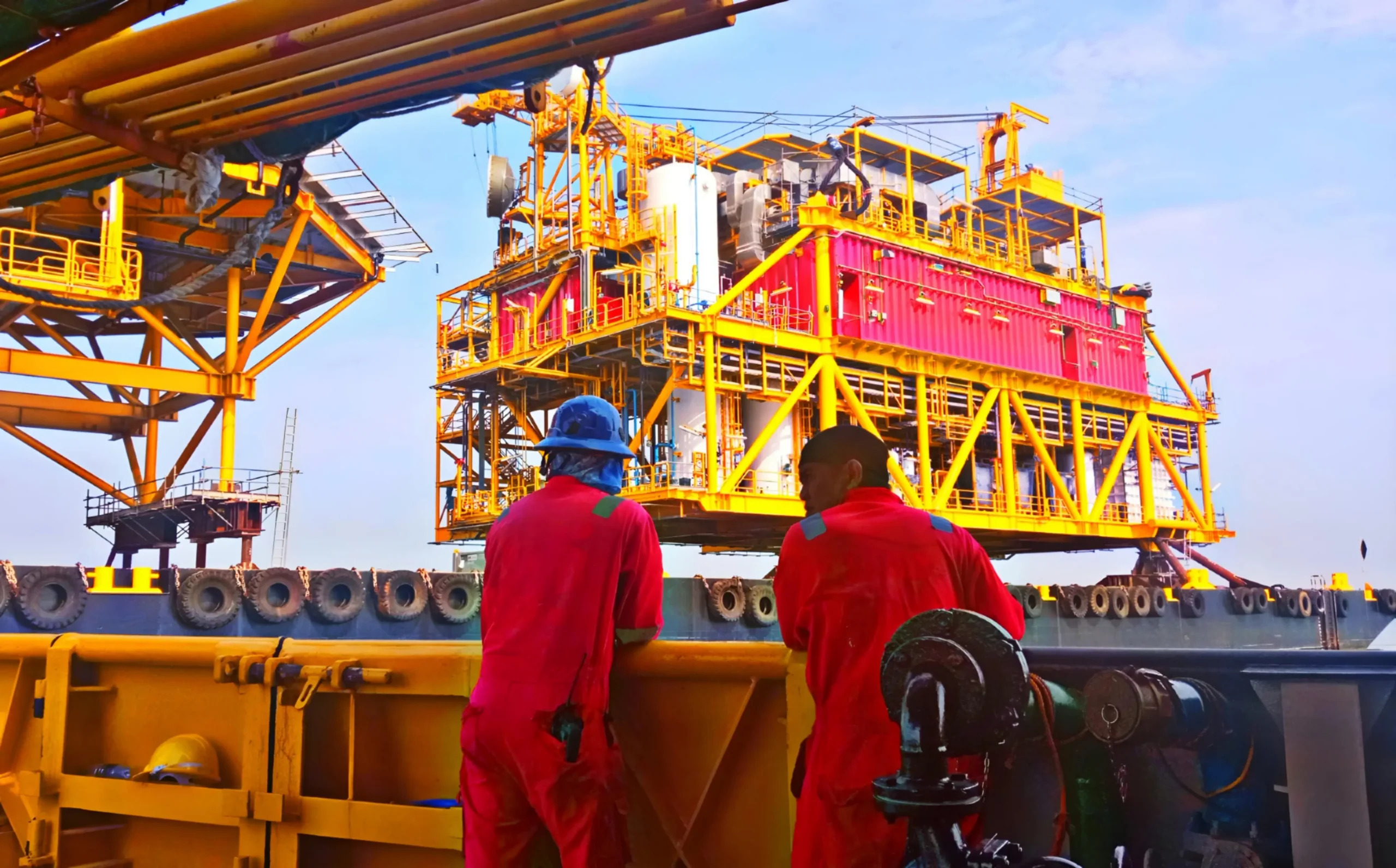 Offshore Workers Overseeing Oil Platform