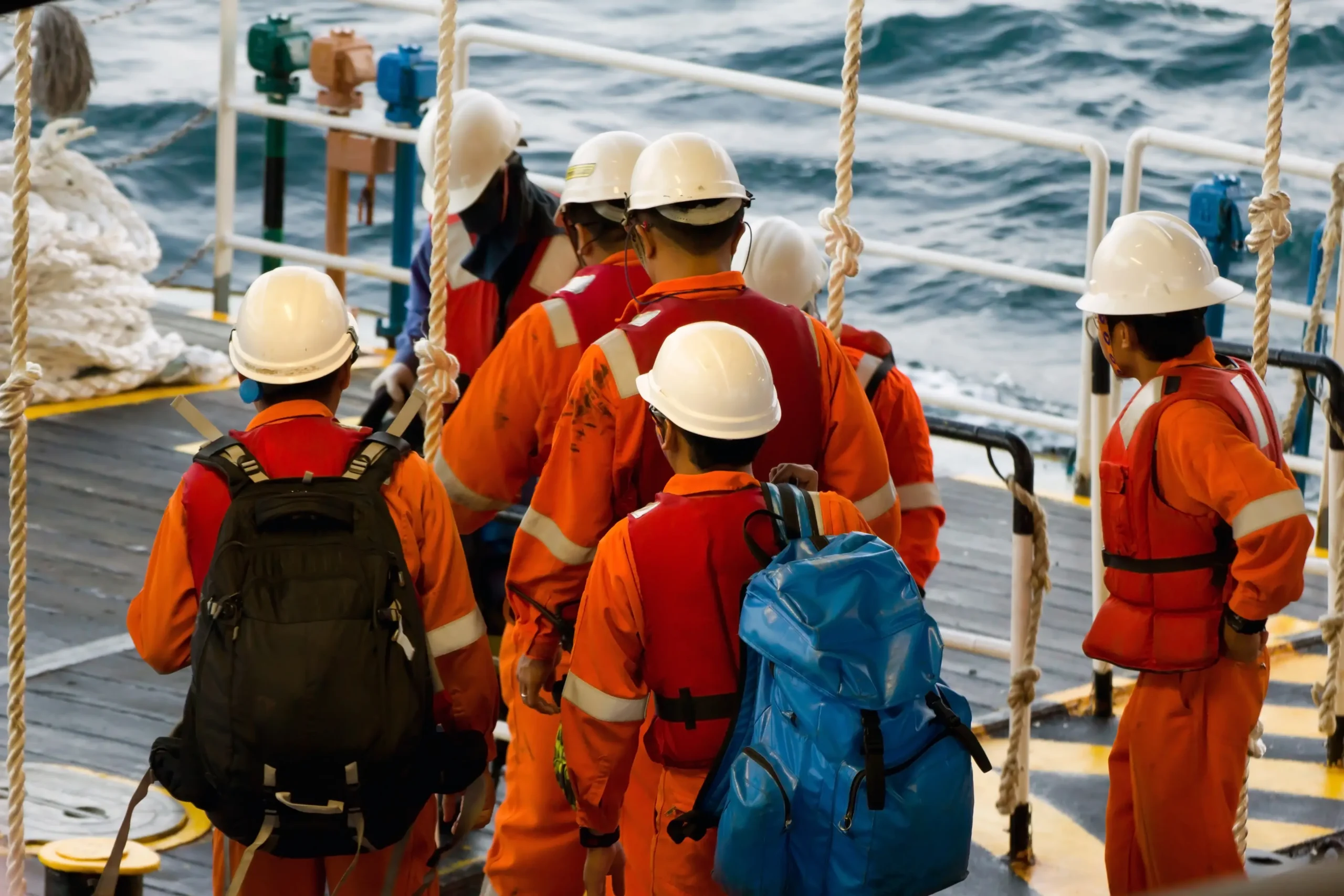 Roughnecks transported to an offshore platform