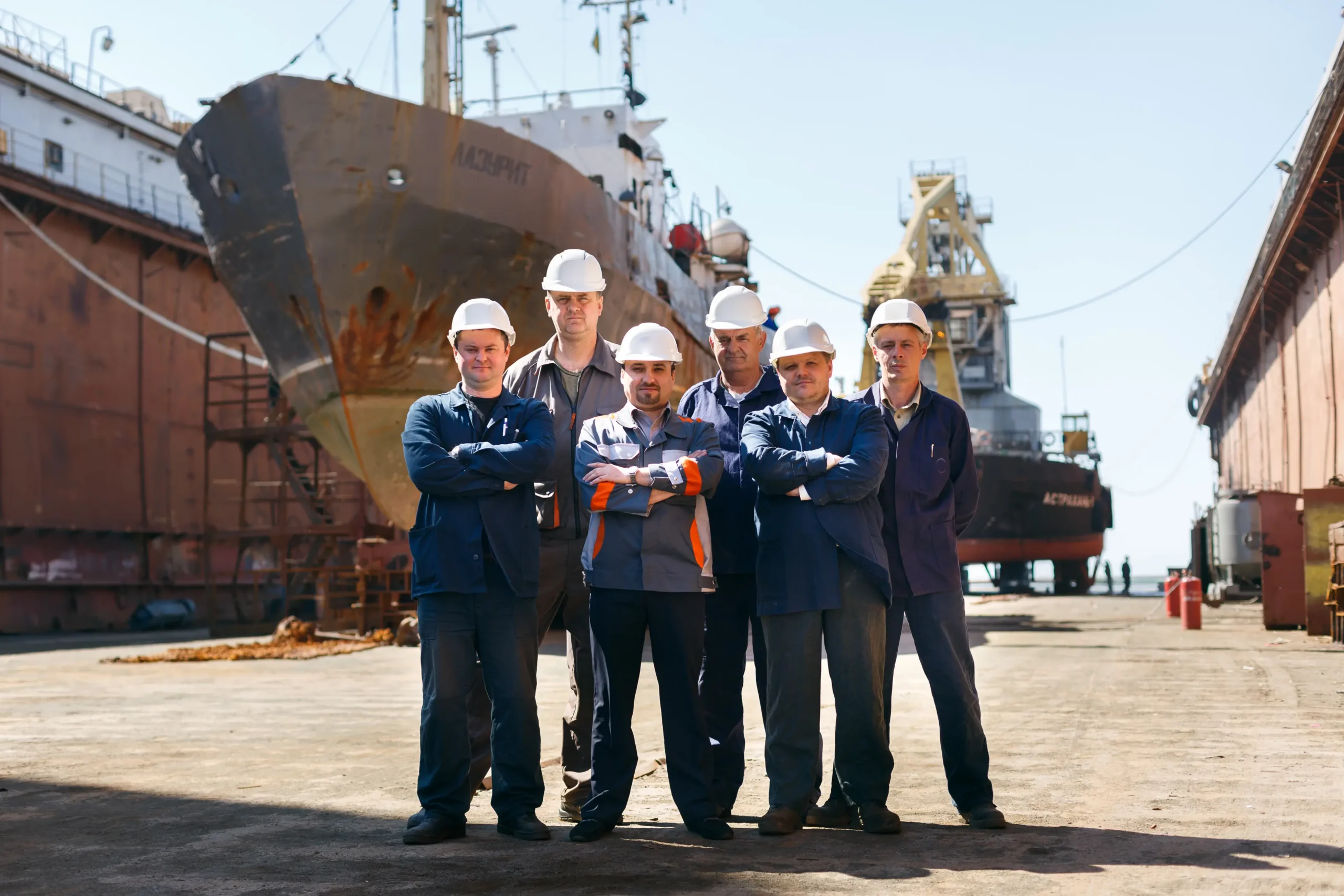 Team of shipyard workers